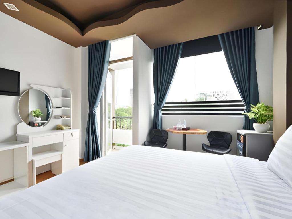 The Noble Swan Wood Park Hotel Cidade de Ho Chi Minh Exterior foto