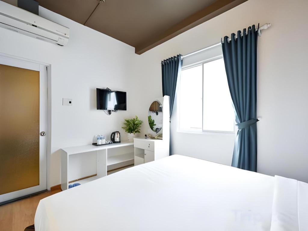 The Noble Swan Wood Park Hotel Cidade de Ho Chi Minh Exterior foto